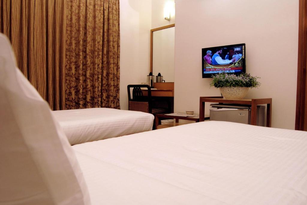 The Ambience Hotel Pune Cameră foto