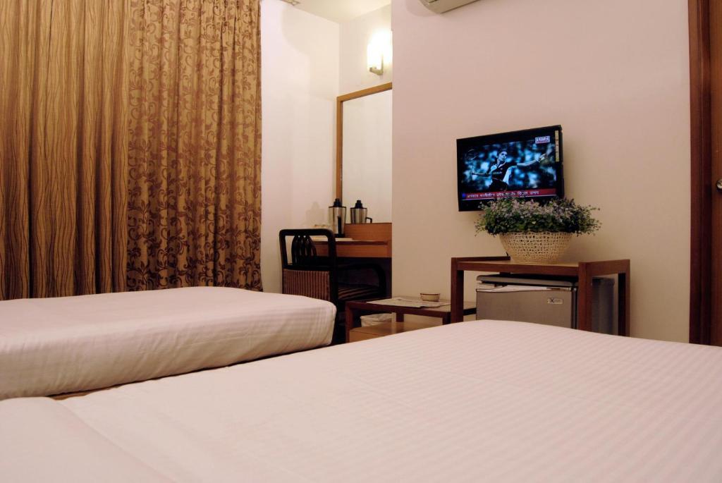 The Ambience Hotel Pune Cameră foto