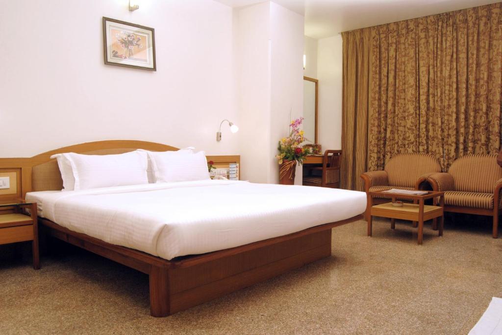 The Ambience Hotel Pune Cameră foto